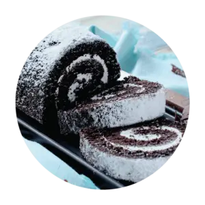 Featured Flavor - Joyful Traditions Chocolate Creme Cake Roll with two slices