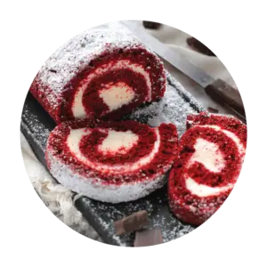 Featured Flavor - Joyful Traditions Red Velvet Cake Roll with two slices