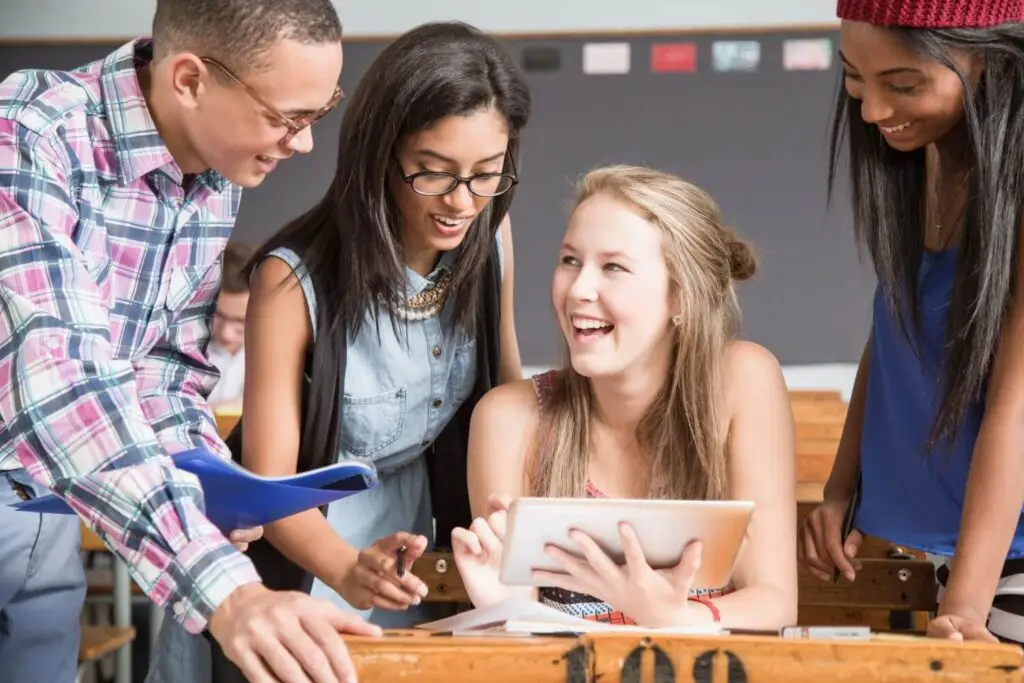 High school students in a classroom working on an activity